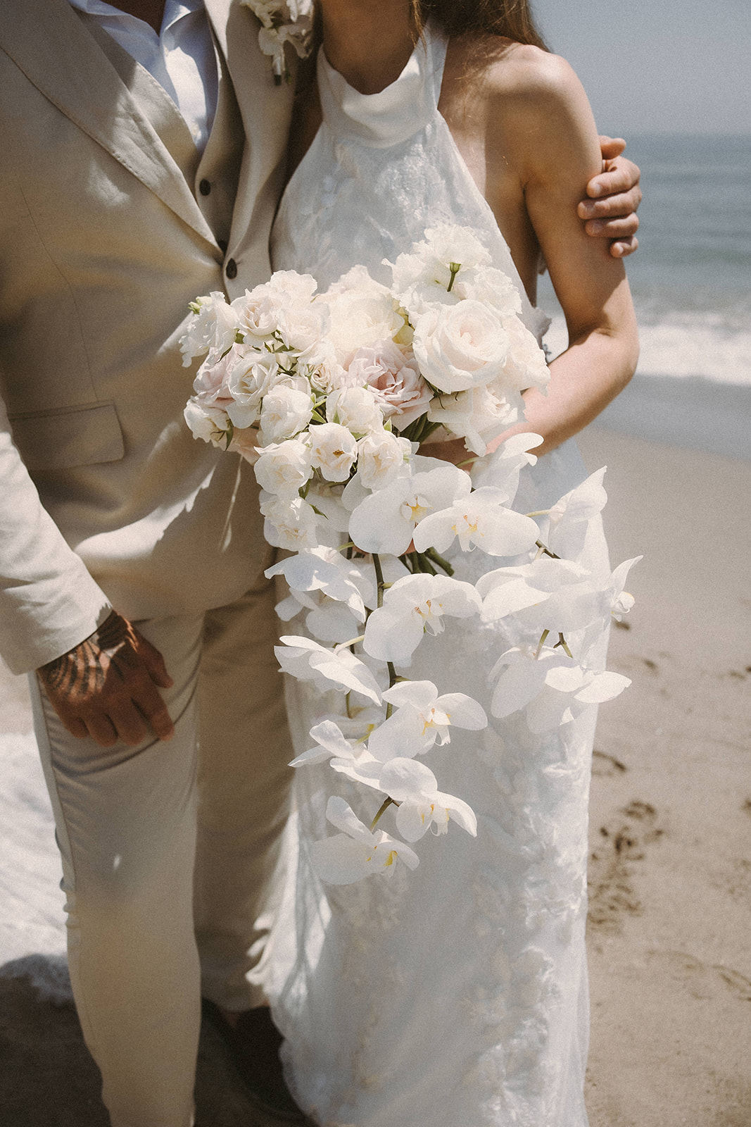 Orchid bridal bouquet by Lemonface Deco, wedding florist in Marbella